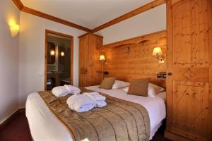 ARC 1950 - Appartement 10 personnes Duplex Cheminée - ski aux pieds - Sauna, Hammam, Jacuzzi