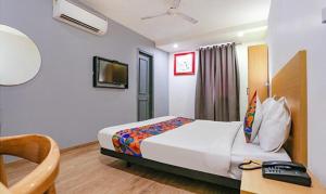 FabHotel Urban Residency Model Town