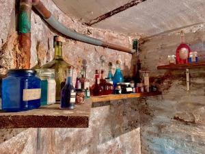 Appartements Repaire du sorcier, escape game, nuit atypique : photos des chambres