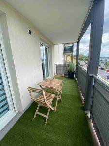 Appartements Le porte bonheur : photos des chambres