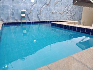 Casa com Piscina e churrasqueira mar casado