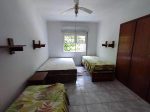 Apartamento no Centro de Pitangueiras, Guarujá - a 100m da Praia