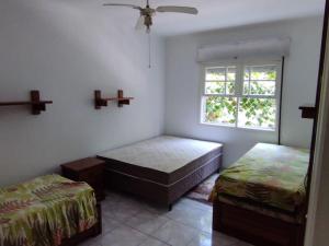 Apartamento no Centro de Pitangueiras, Guarujá - a 100m da Praia