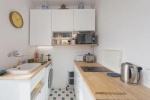 Appartements La BALEINE BLEUE : photos des chambres