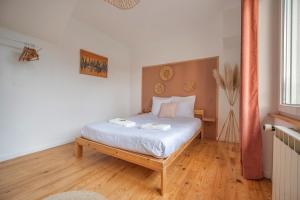 Appartements Le Loft - Triplex 200m2 en centre-ville : photos des chambres