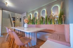 Appartements Le Loft - Triplex 200m2 en centre-ville : photos des chambres