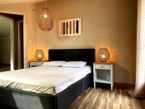 Appartements Cosy au calme, climatisation, 3min A41 : photos des chambres