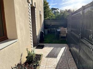 Maisons de vacances Petite maison de charme a 10 minutes de Disney ! : photos des chambres