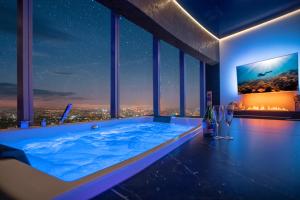 Apartamenty Sky Tower z Jacuzzi Przy Oknie