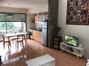 Duplex dos ambientes con terraza propia y parilla