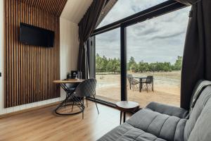 Atpūtas komplekss Pazust Priedēs - SUNRISE house