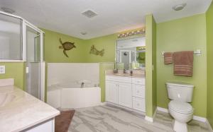 Cozy up in this gorgeous coastal themed 32 condo with views of the estuary OW10-303