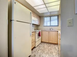 Beachfront with a pool at Ocean Trillium Condo ~ 101