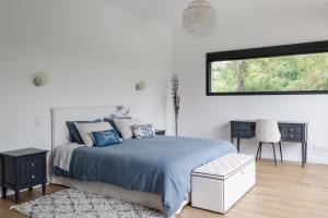 Maisons de vacances La Maison L'Eperon, stylish 5 star villa surrounded by vineyard near Saint Emilion : photos des chambres