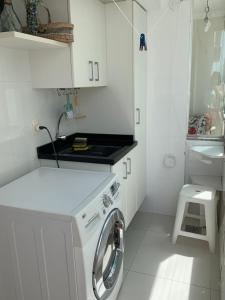 Pe na areia frente mar