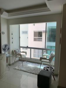 Pe na areia frente mar