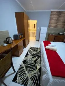 Comrades Oasis Guest House - 希尔顿