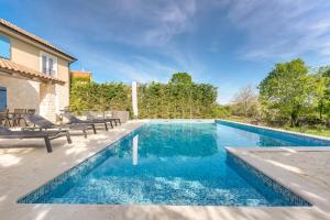 Romantic villa with a large pool surrounded by greenery - by TRAVELER tourist agency Krk ID 2150 
