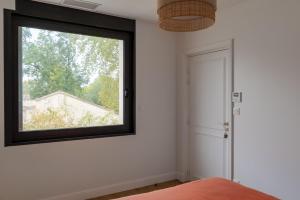 Maisons de vacances La Maison L'Eperon, stylish 5 star villa surrounded by vineyard near Saint Emilion : photos des chambres