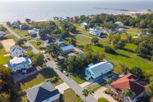 Sunny Waveland Home Rental with Pool Walk to Beach!
