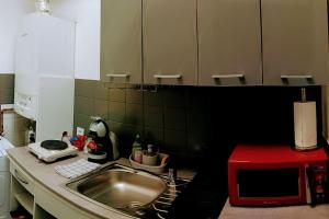 Appartements Petit studio pour 4 personnes avec coin jardin : photos des chambres