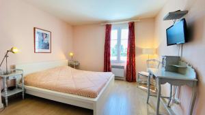 Villas Au calme, villa avec piscine : photos des chambres