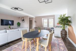 Appartement de 100m2 dans un parc à 20 mn du centre de Paris