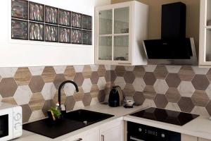 Le REGENCY, appartement familial au cœur du centre-ville, des célèbres jardins Biovès, et seulement à 1 minute à pied de la plage