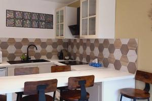 Le REGENCY, appartement familial au cœur du centre-ville, des célèbres jardins Biovès, et seulement à 1 minute à pied de la plage