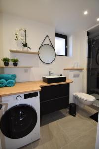 Appartements Le Black Bulle : photos des chambres