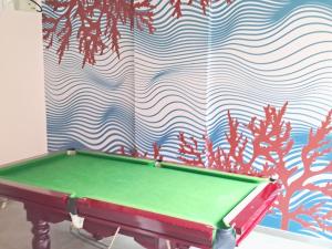 Premium 2BHK -10 min to GOI airport & beach -Pool access -Balcony with city view