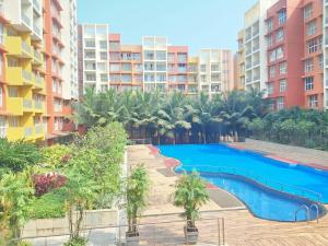 Premium 2BHK -10 min to GOI airport & beach -Pool access -Balcony with city view