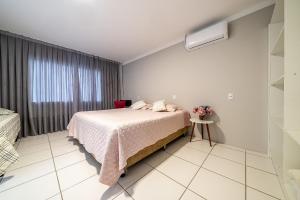 148 - Casa pé na areia Mariscal com 04 dormitórios