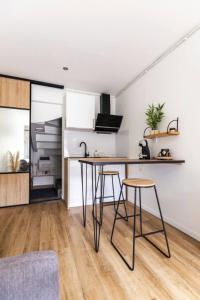 Appartements Studio 63 : photos des chambres