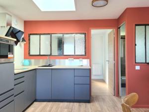 Appartements Appartement au coeur du Village avec terrasse : photos des chambres
