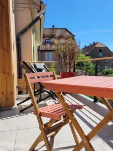 Appartements Appartement au coeur du Village avec terrasse : photos des chambres