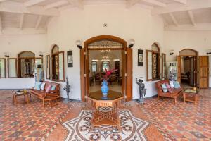 SaffronStays Mosaic - 4BR 100-year-old heritage villa with lawns, porch sit-outs & play area near Lonavala