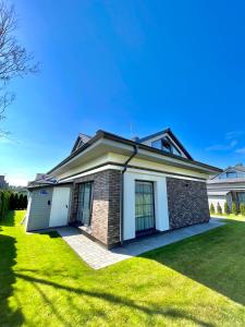 Saulėlydžio namas Kunigiškėse