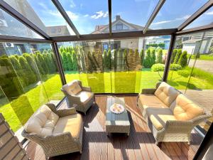 Saulėlydžio namas Kunigiškėse