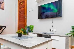 Cozy & Stylish 1-Bedroom Apartment by Havana Properties located in Kinondoni Vijana