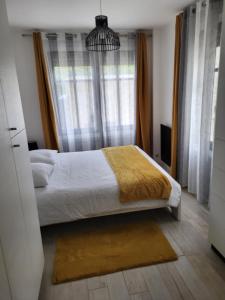 Appartements Bel appartement spacieux et confortable idealement situe : photos des chambres