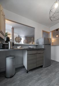 Appartements Le Duplex - Grand appartement centre ville : photos des chambres