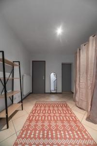 Appartements Le Duplex - Grand appartement centre ville : photos des chambres