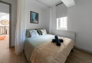 Appartements Le Duplex - Grand appartement centre ville : photos des chambres