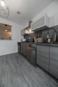 Appartements Le Duplex - Grand appartement centre ville : photos des chambres