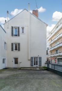Appartements Le Duplex - Grand appartement centre ville : photos des chambres