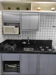 APTO 50M PRAIA- 4 PESSOAS, WIFI, SACADA, CHURRASQUEIRA, GARAGEM PARA VEICULOS PEQUENOS - Residencial Roveda