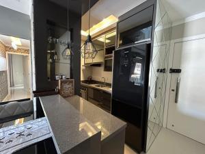 Apartamento confortável com piscina