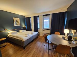 Double/Twin Room with Sofa Bed and Kitchenette room in Lidingö Arena Hotell