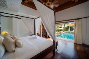 Saitaan,4BR seaside garden pool villa, Laguna area